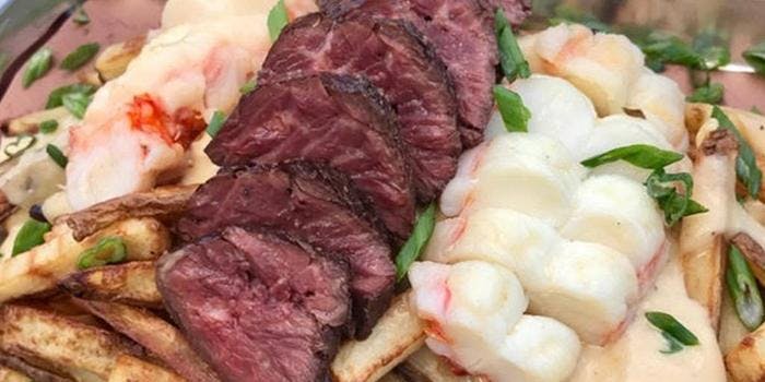 image of Grilled Hanger Steak and Lobster Fondue Poutine