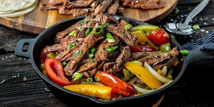 image of Sizzling Fajitas With Grilled Skirt Steak