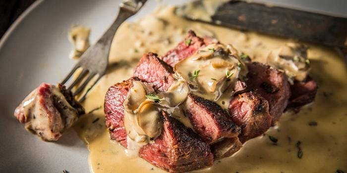 image of Grilled Peppercorn Steaks with Mushroom Cream Sauce