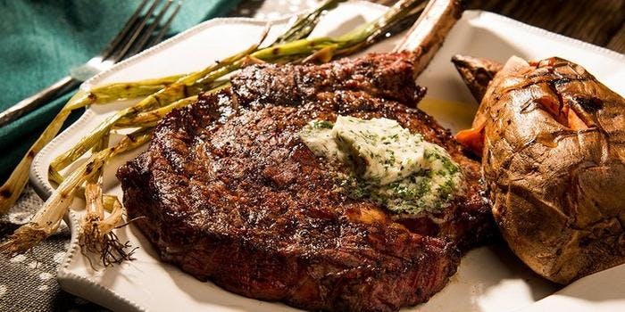 image of Smoked Rib-Eyes with Bourbon Butter