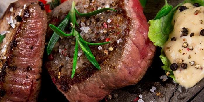 image of Grilled Top Sirloin Steaks With Mixed Peppercorns