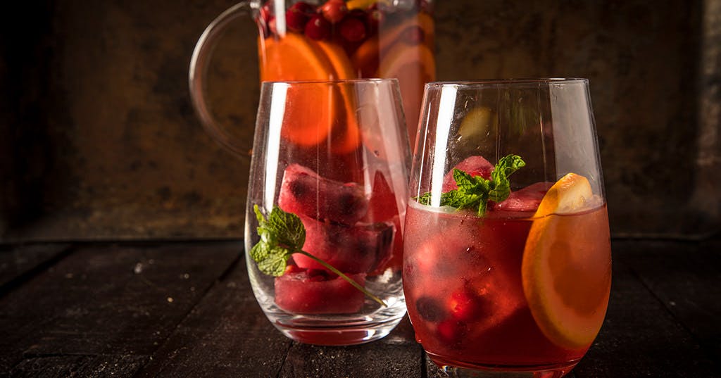 Cran-Apple Tequila Punch with Smoked Oranges